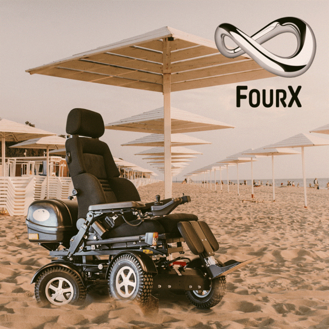 Four X Rollstuhl Strand